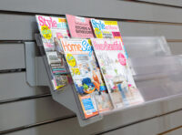 A photo of a magazine display unit.